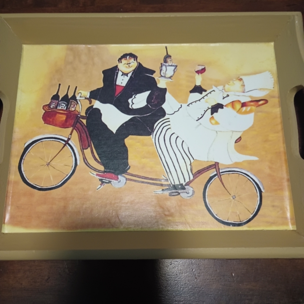 Two small wooden chef guy trays.